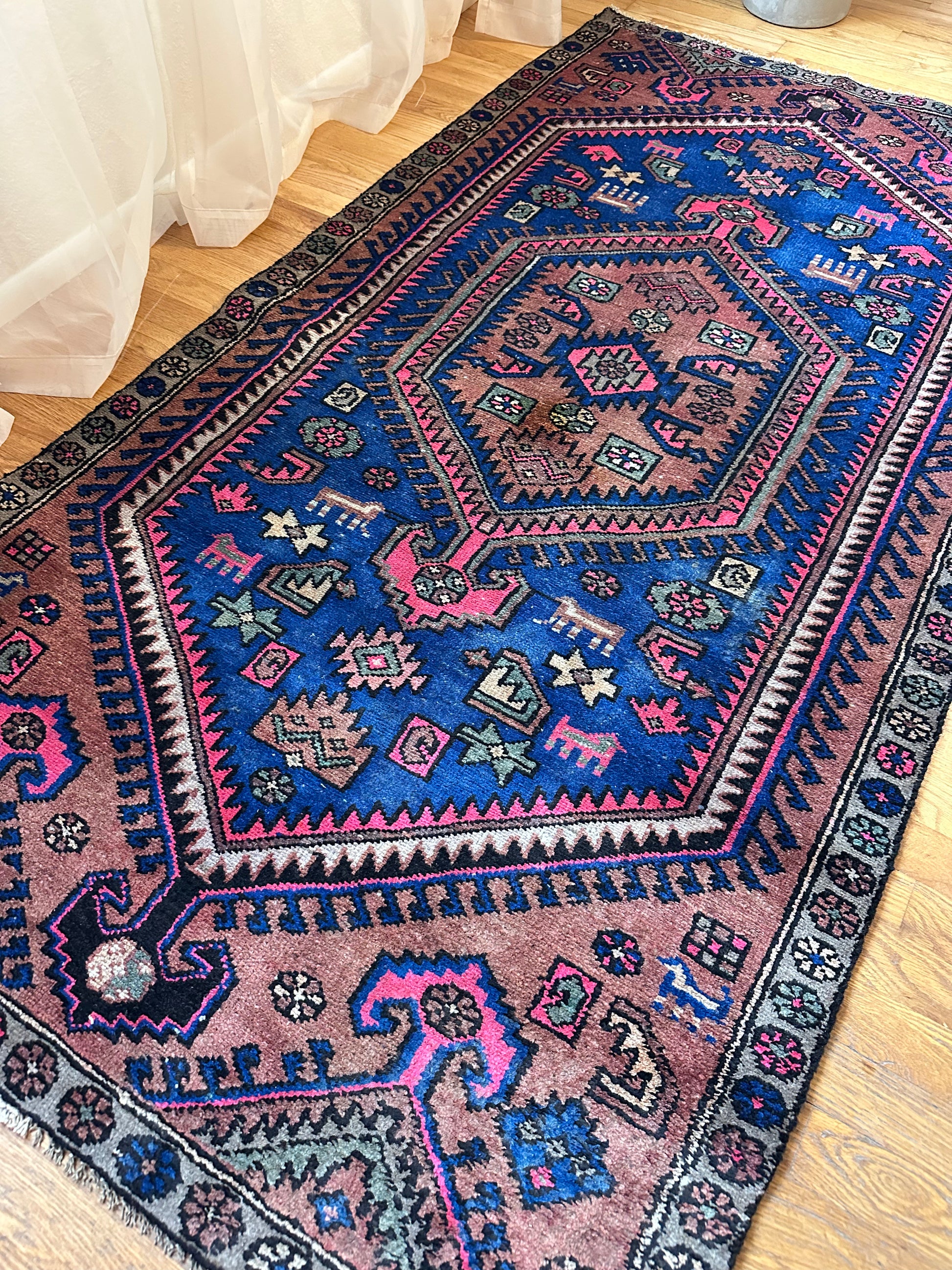 Bold colored vintage herki rug