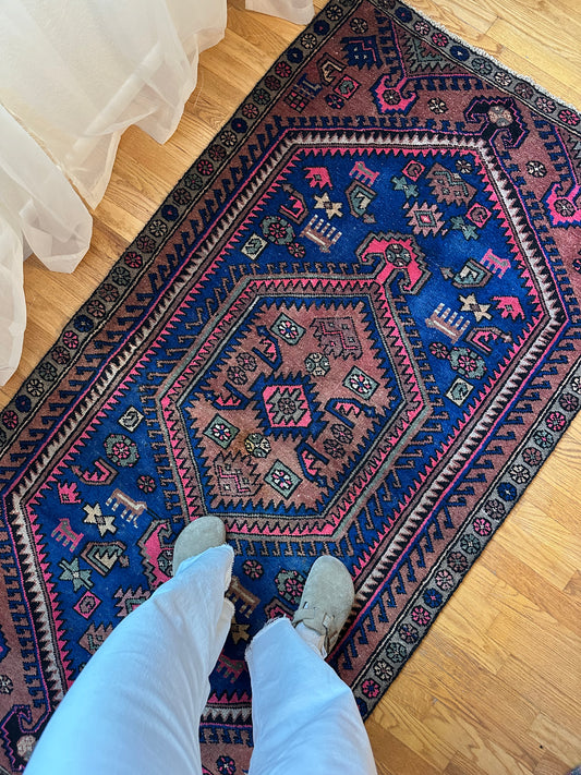Bold colored vintage herki rug