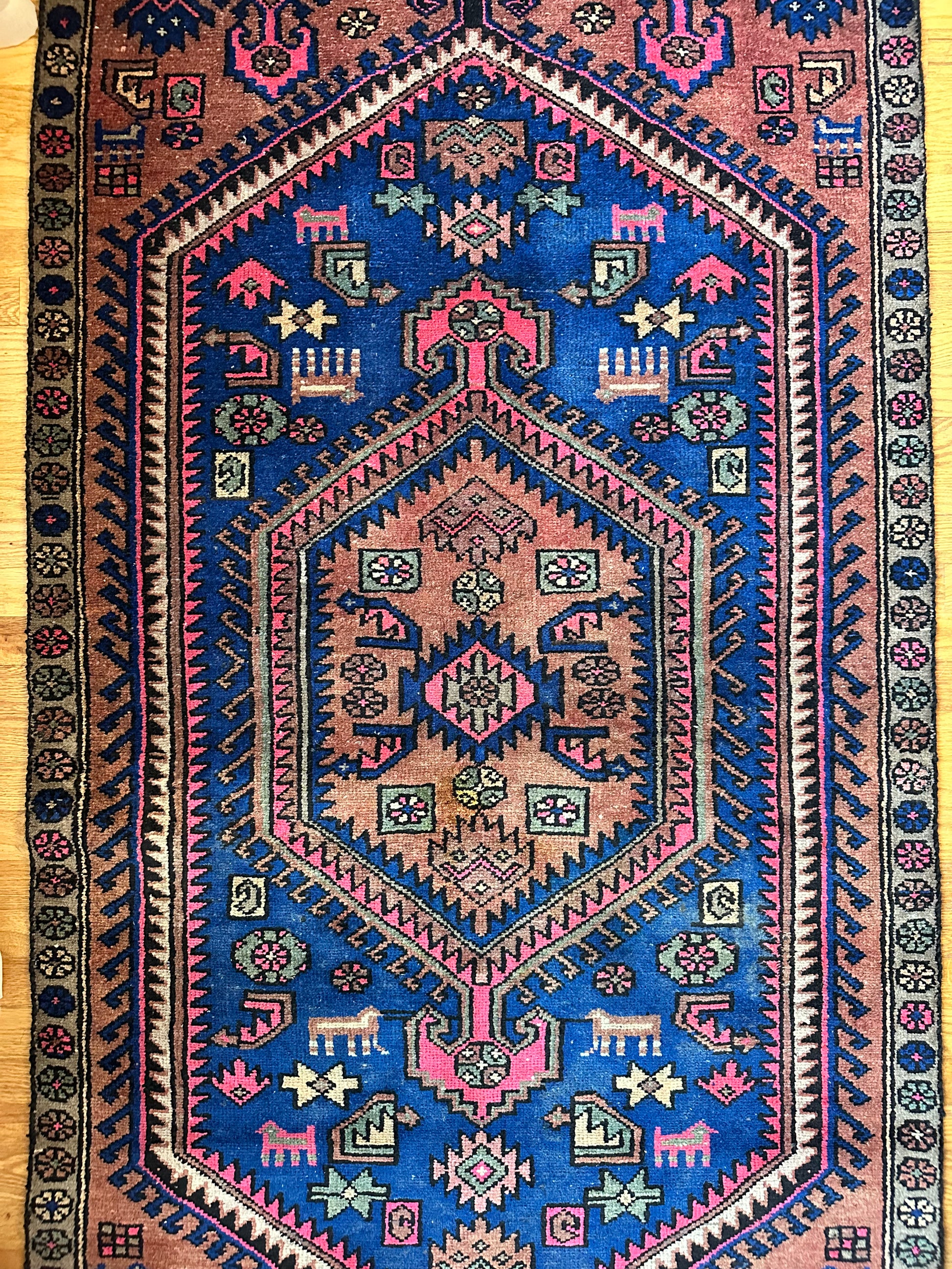 Bold colored vintage herki rug