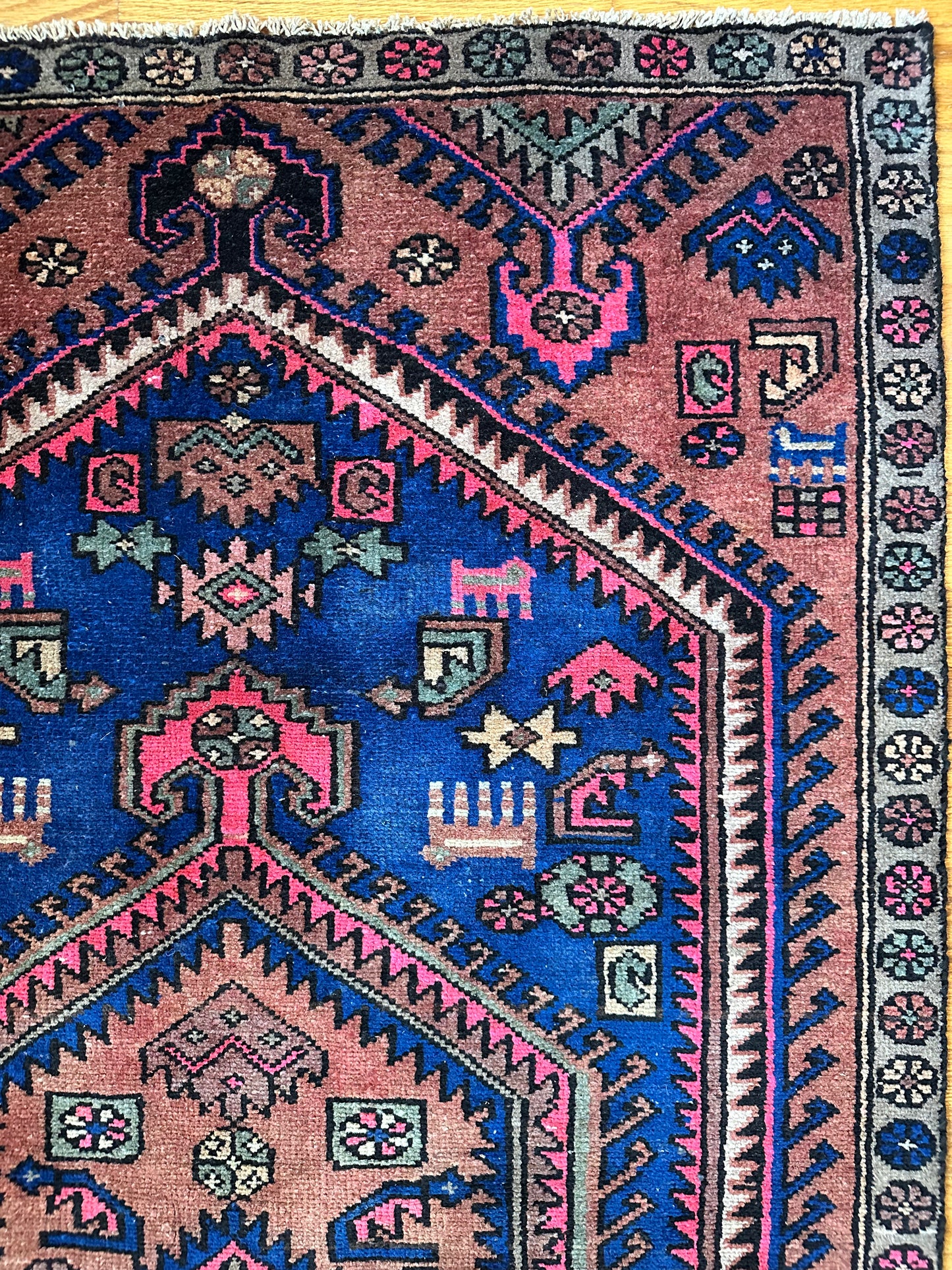 Bold colored vintage herki rug