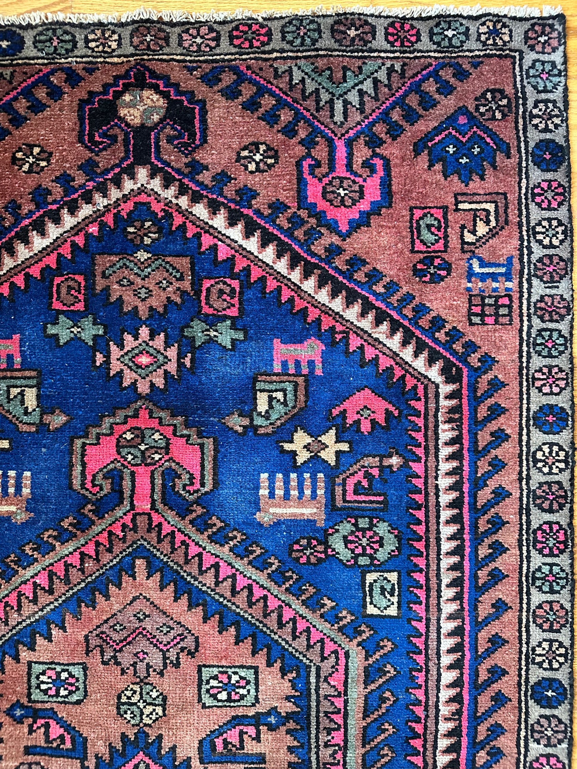 Bold colored vintage herki rug