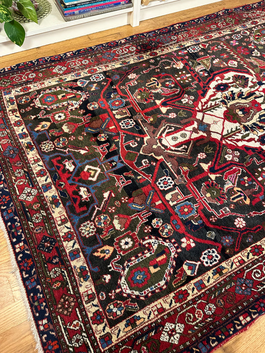 Vintage Heriz Persian Rug with bold geometric motifs